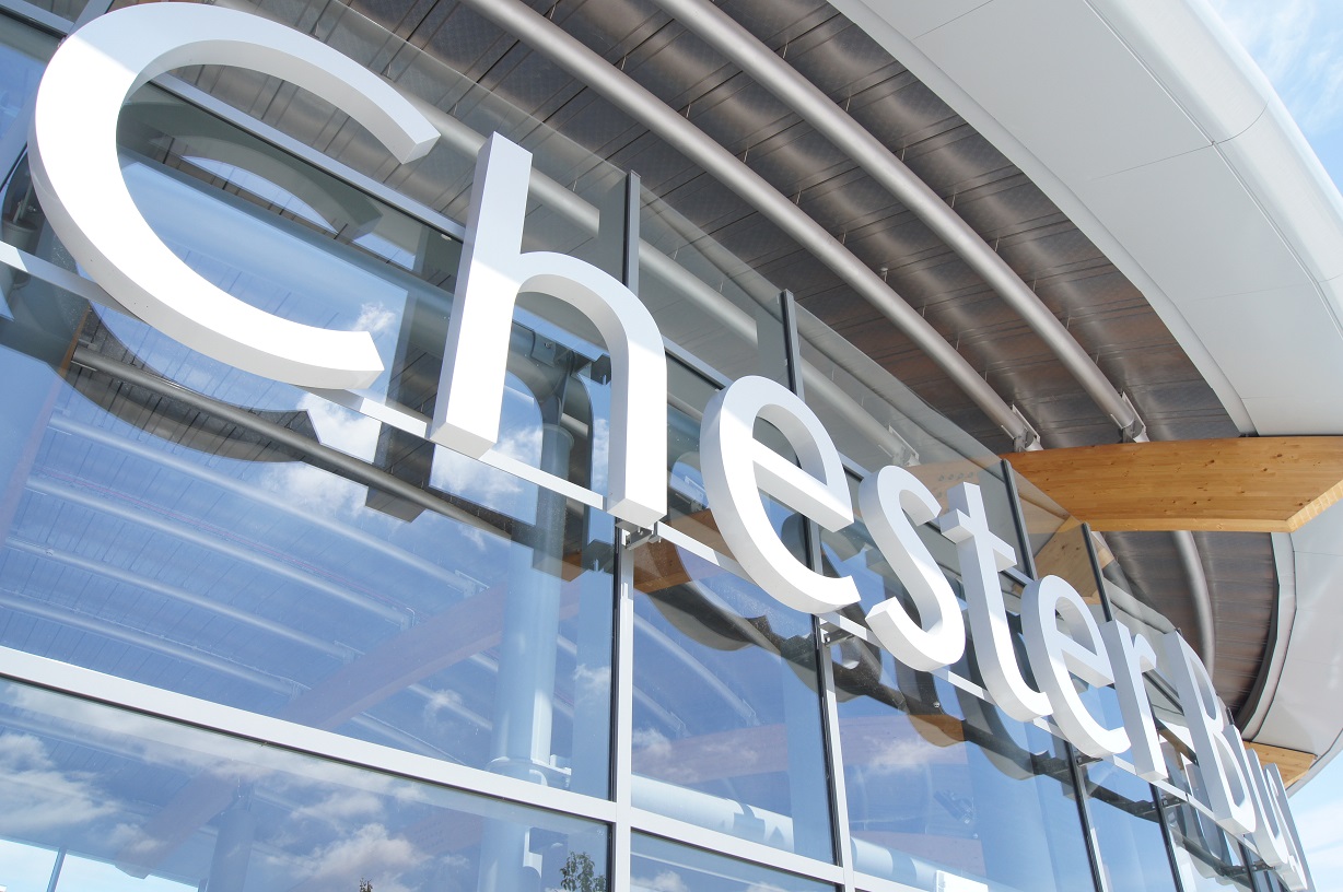 Chester Bus Interchange built up powder coated white text fitted to rail.