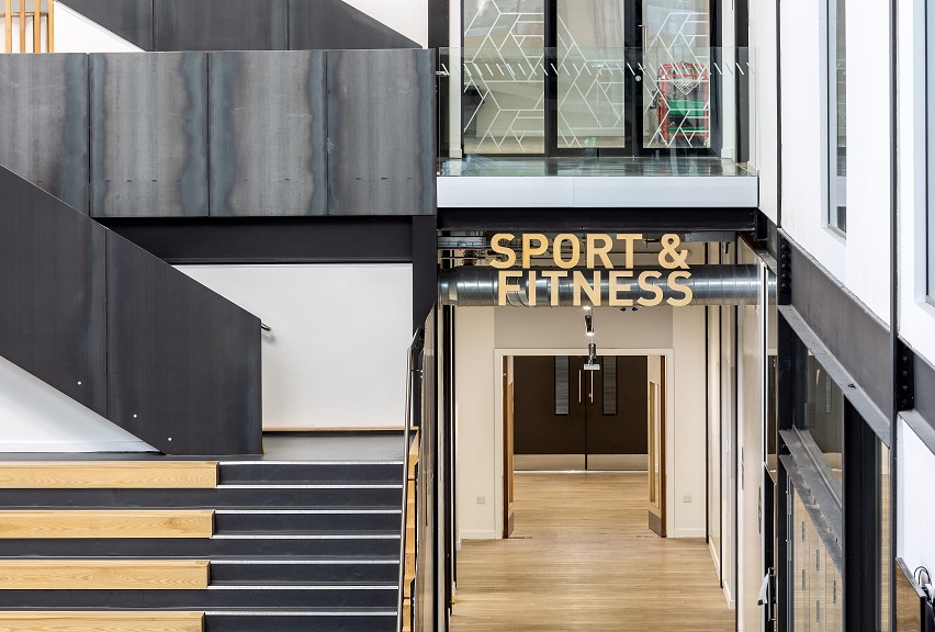 Jedburgh Campus timber text reading Sports and Fitness.