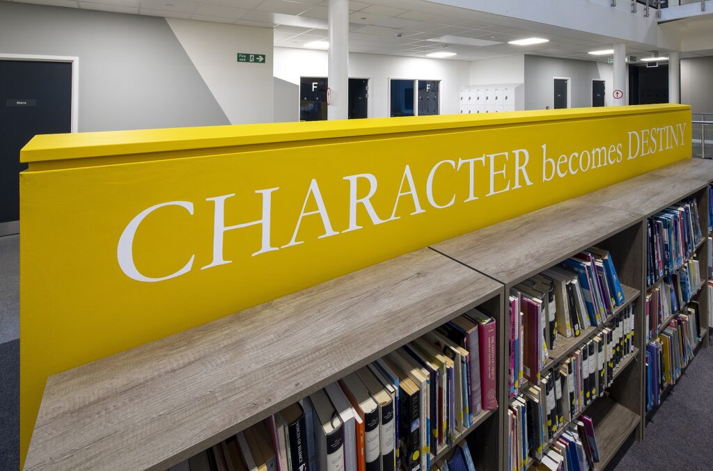 Ponteland Schools Library Bookshelves. Print and Cut vinyl quotes.