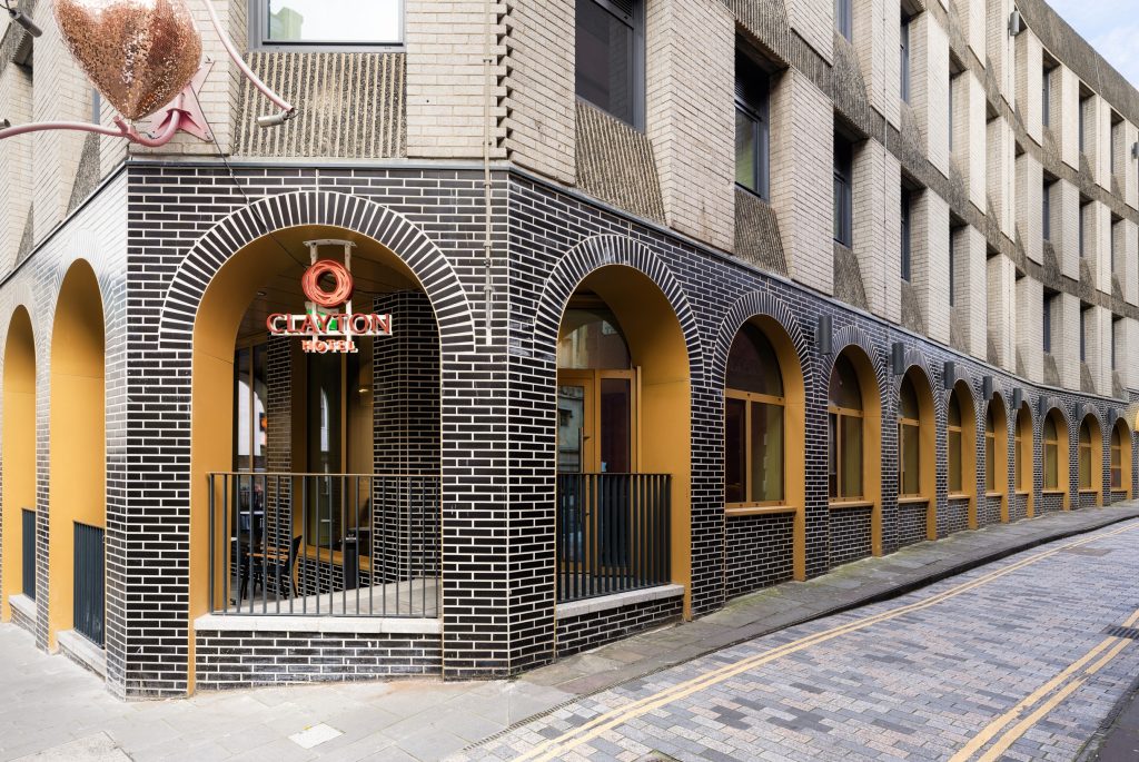 Clayton Hotel Bristol external powder coated text and logo sign fitted under a brick arch