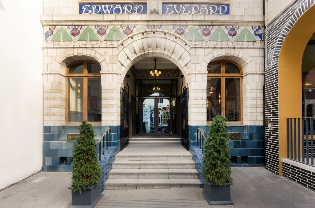 Clayton Hotel Bristol main entrance showing brass signs fitted into facade stonework