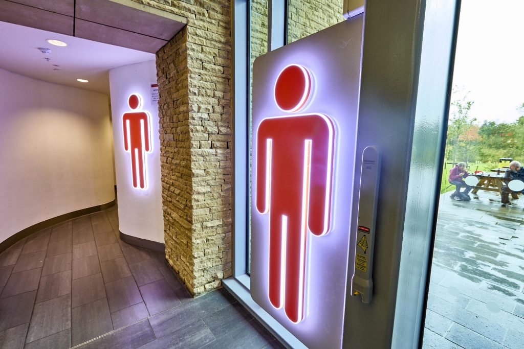 Skelton Lake Illuminated Mens Toilet Sign.