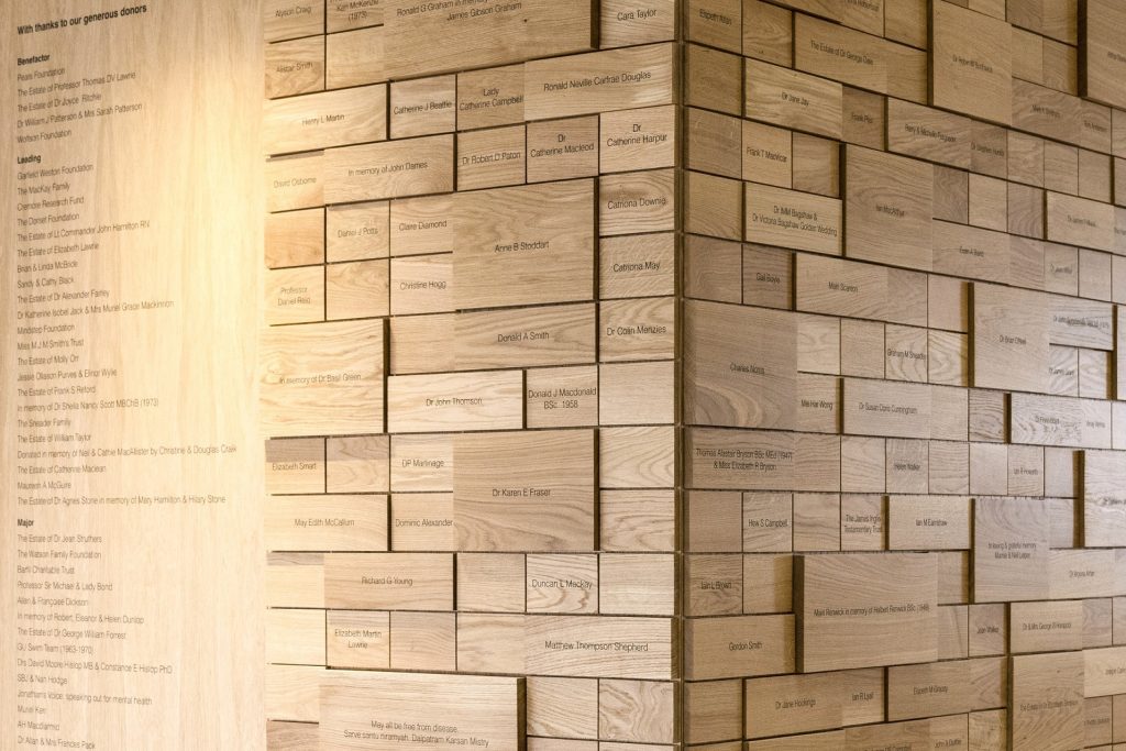 University of Glasgow Clarice Pears Building Donor Wall. Engraved oak tiles