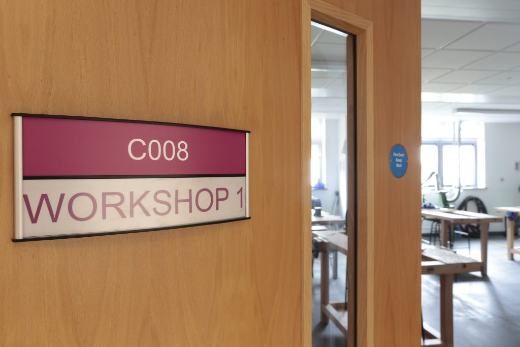 Dfe Schools example door interchangeable sign curved with separator