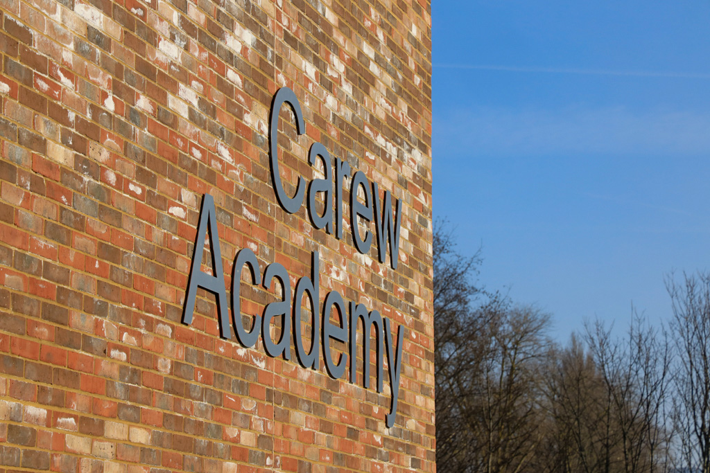 Carew Academy Dfe School flat cut text building Sign