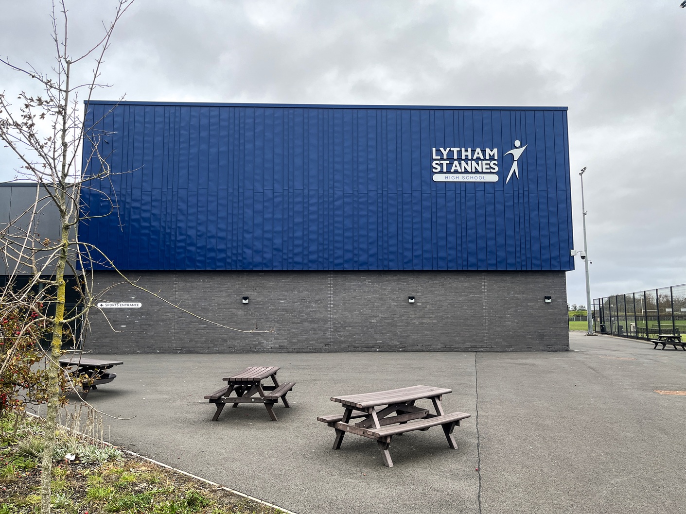 Lytham St Annes High School External building sign. White built up text and logo on side elevation