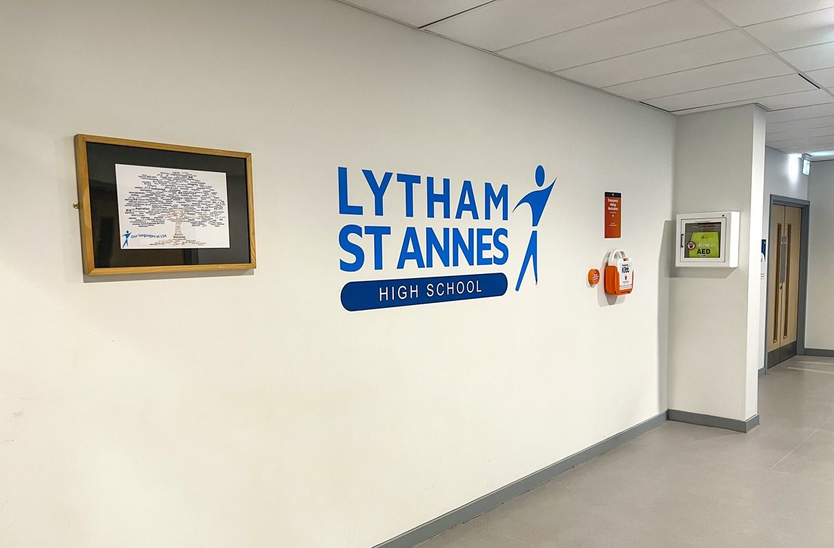 Lytham St Annes High School Vinyl Text Signage applied to a white plasterboard wall in the schools reception area