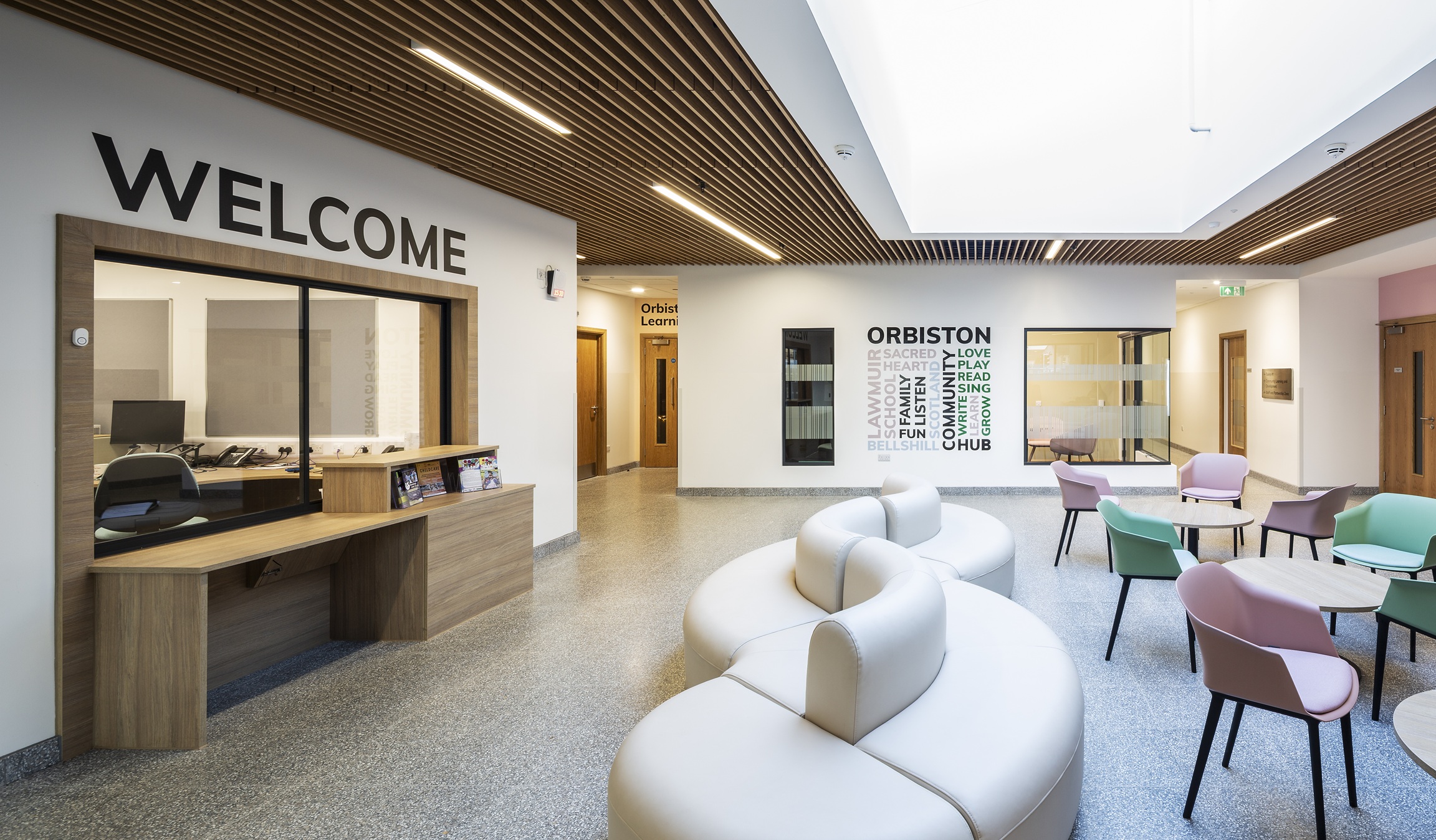 Orbiston Community Hub Reception Area with a vinyl WELCOME Sign above the reception window