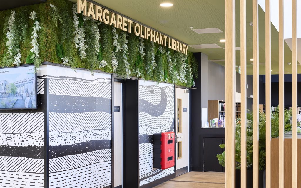 Wallyford Learning Campus, timber text, margaret oliphant library. Sustainability in signage example